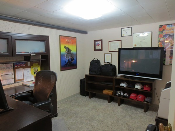 30 Sachem Road Needham, MA 02494 - Photo 14 of 19 a living room with furniture and a flat screen tv