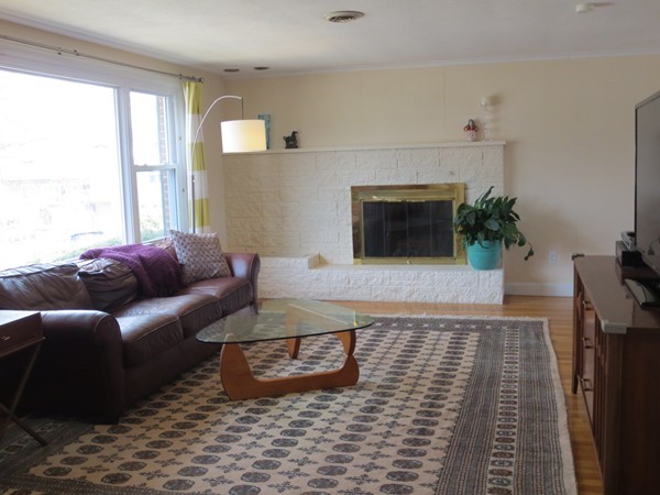 30 Sachem Road Needham, MA 02494 - Photo 3 of 19 a living room with furniture and a fireplace