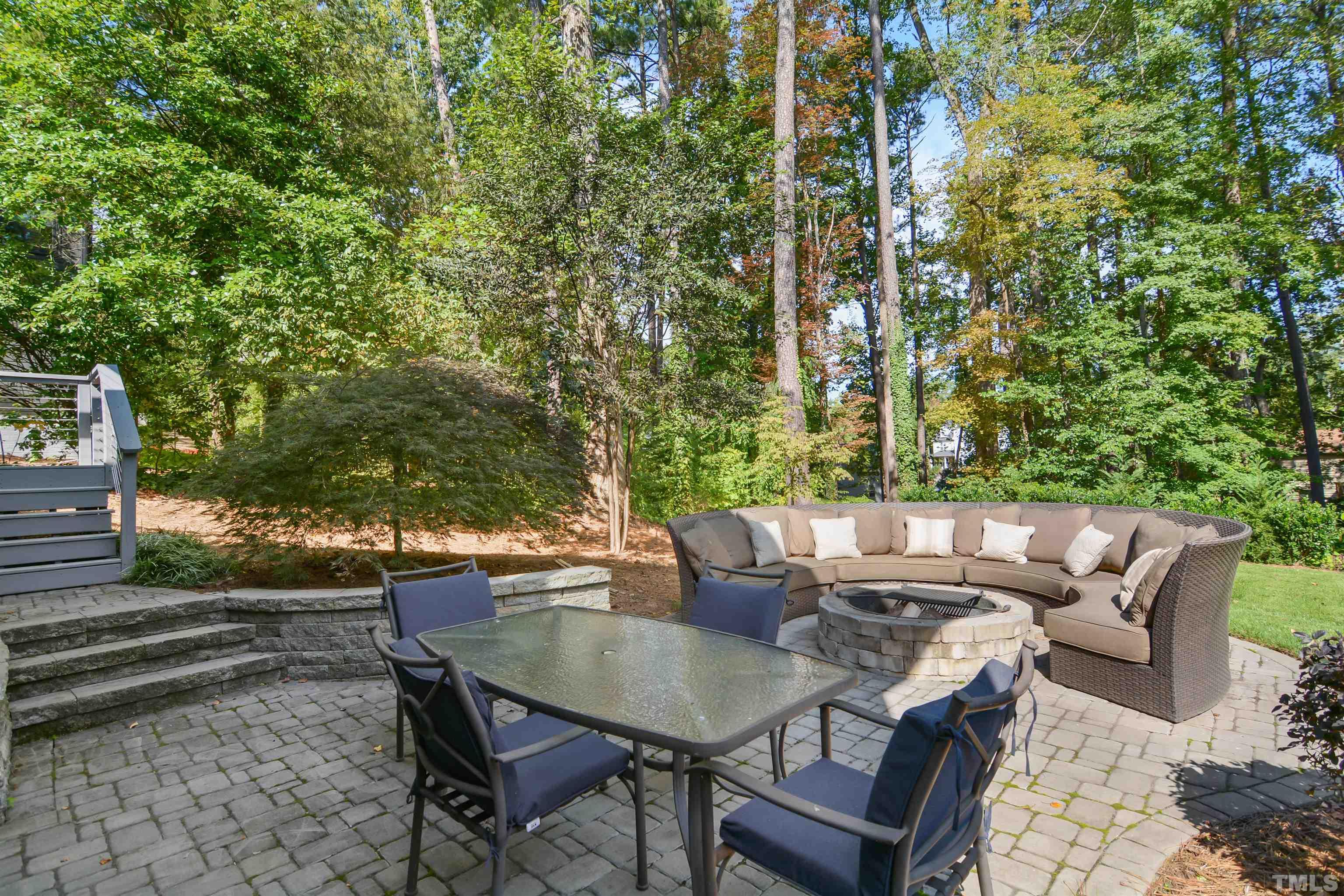 3210 Hampton Road Raleigh, NC 27607 - Photo 31 of 34 a backyard of a house with table and chairs