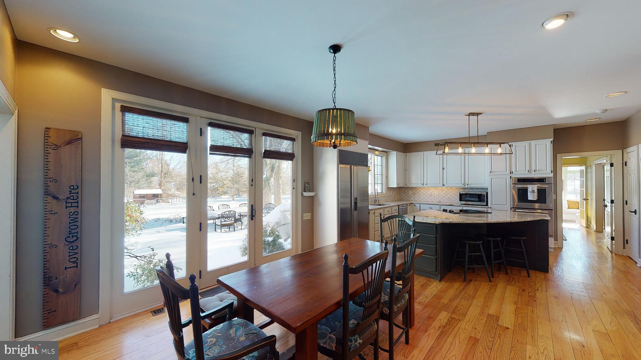 3985 Ruckman Way Doylestown, PA 18902 - Photo 15 of 51 Wall of windows to outside patio