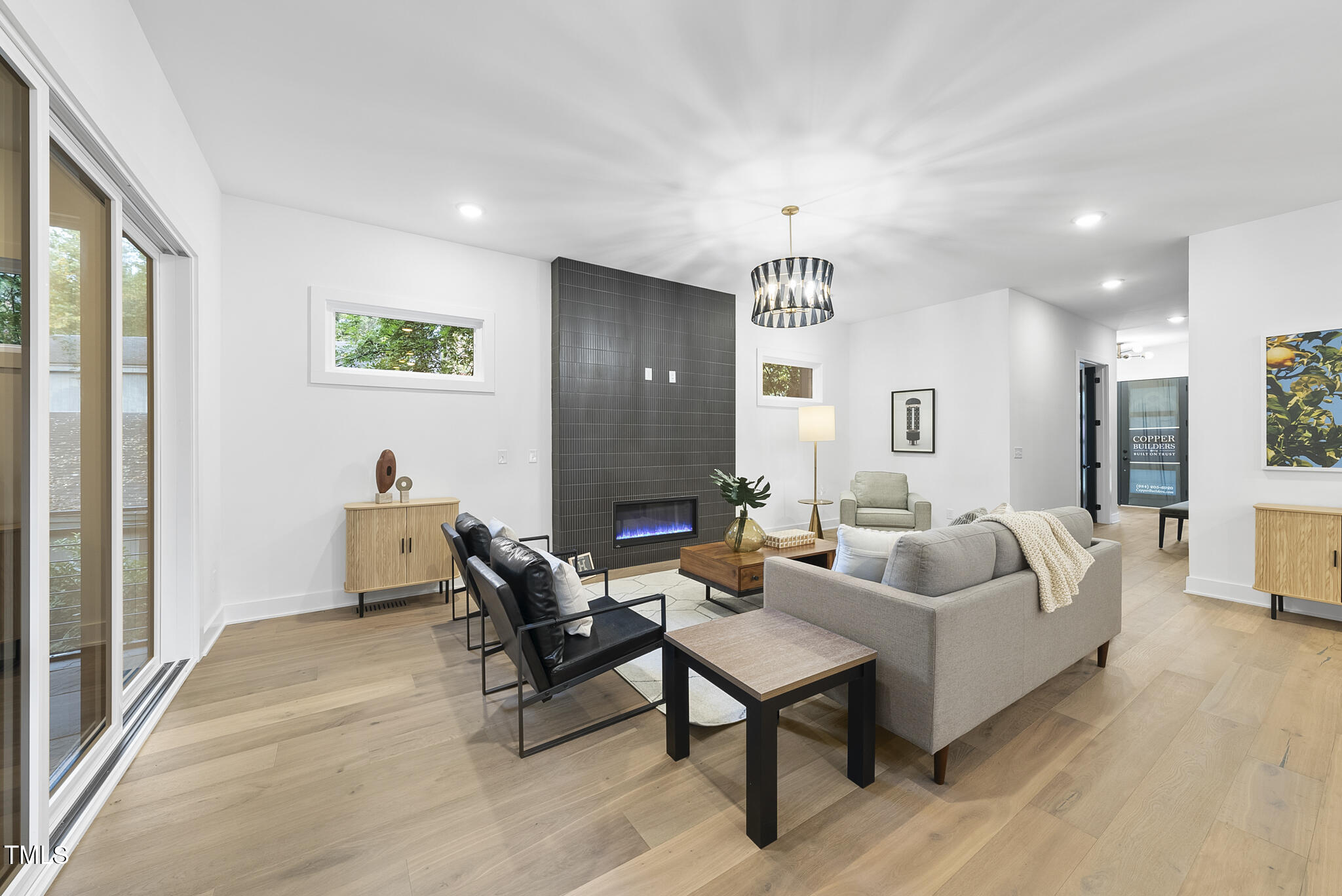 2603 Mayview Road Raleigh, NC 27607 - Photo 12 of 44 a living room with furniture and a large window