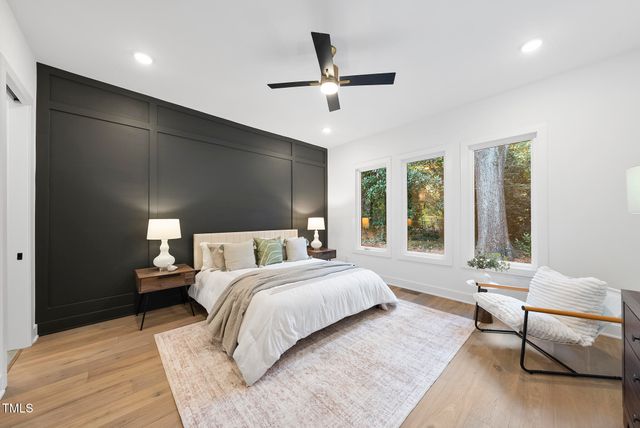 a bed room with a bed and a couch