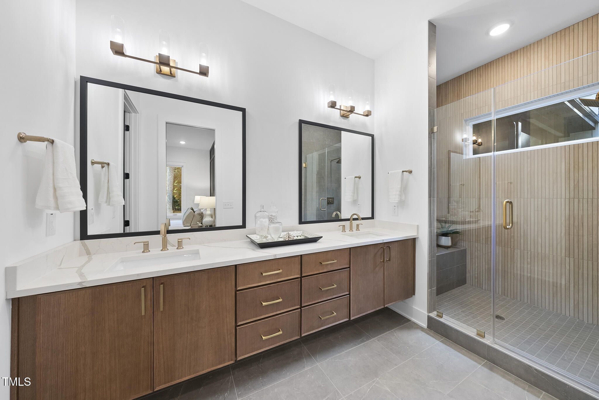 2603 Mayview Road Raleigh, NC 27607 - Photo 15 of 44 a bathroom with a double vanity sink mirror and double
