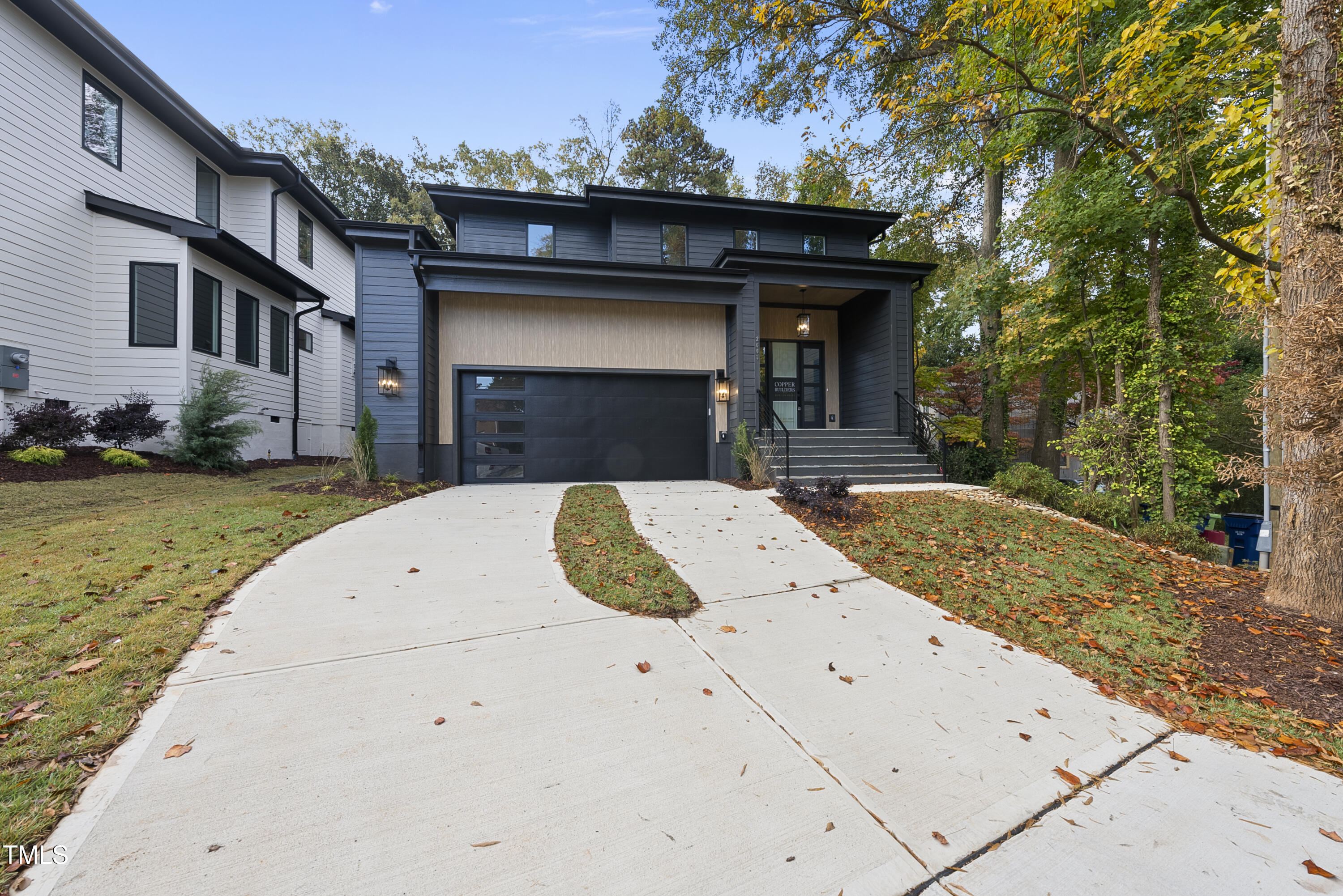 2603 Mayview Road Raleigh, NC 27607 - Photo 2 of 44 a view of a house with a yard