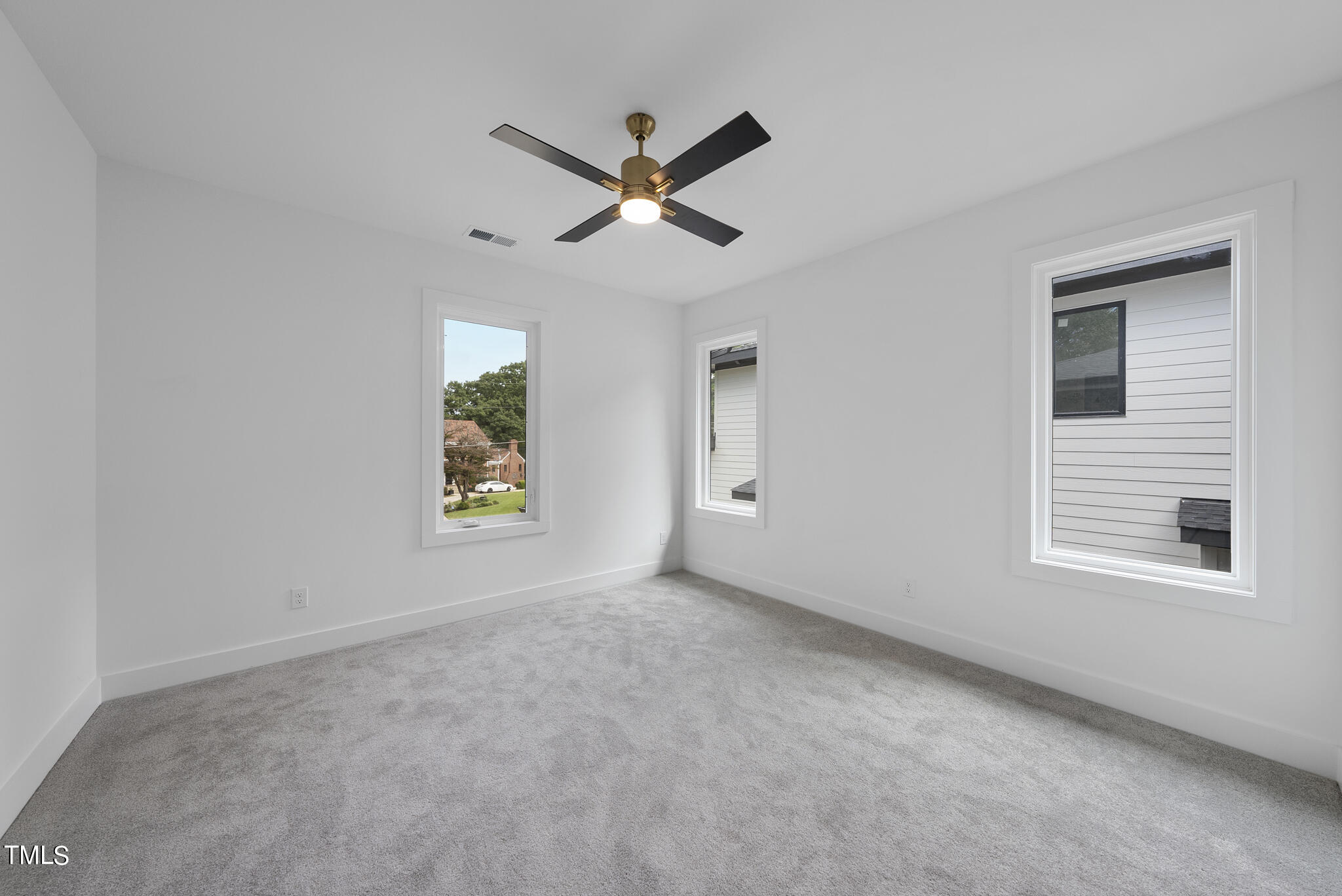 2603 Mayview Road Raleigh, NC 27607 - Photo 23 of 44 a view of an empty room with a window