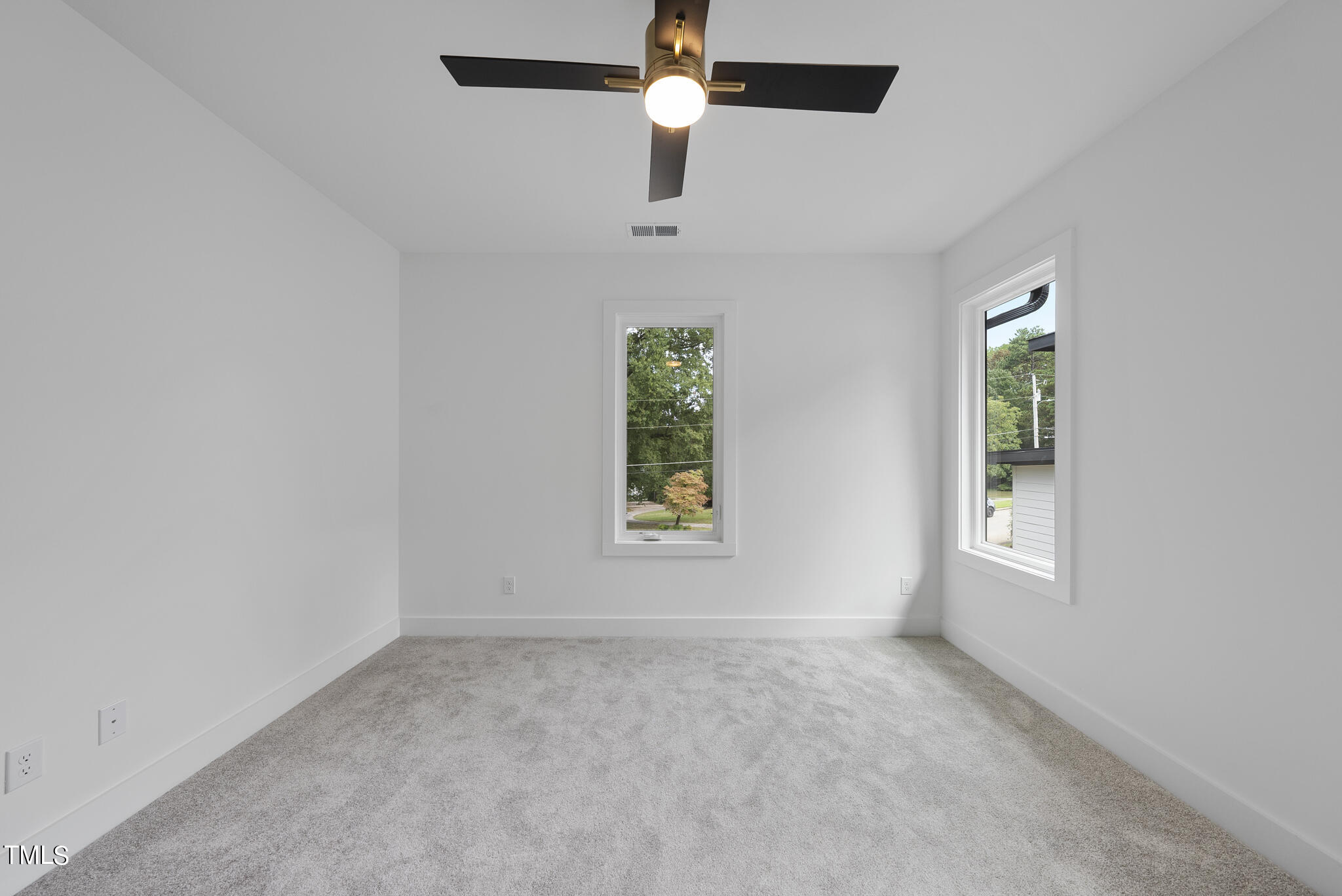 2603 Mayview Road Raleigh, NC 27607 - Photo 24 of 44 an empty room with windows and entryway
