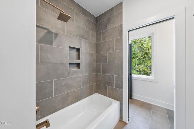 a bathroom with a bathtub