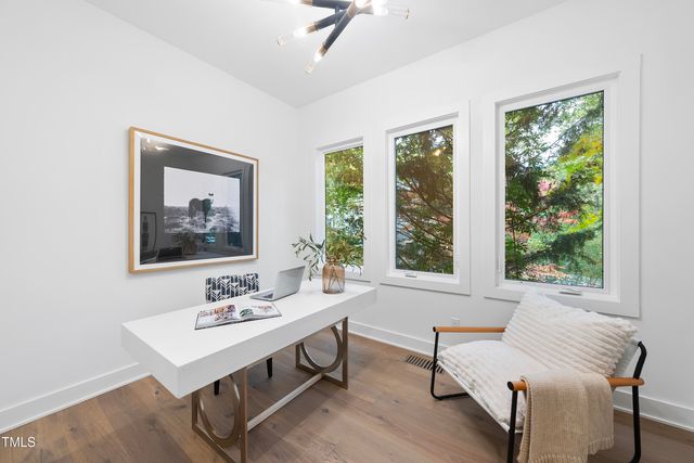 a living room with furniture and window