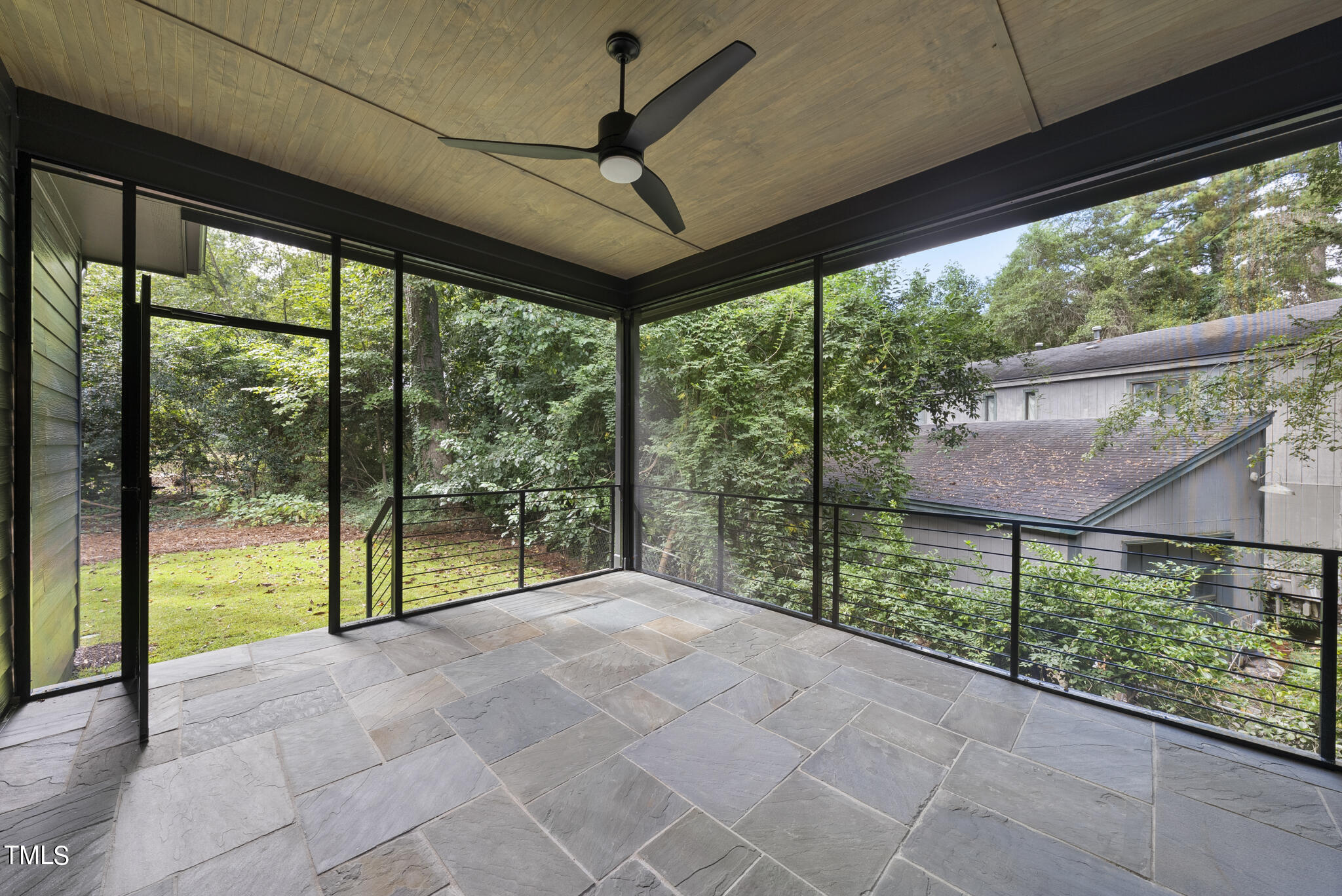 2603 Mayview Road Raleigh, NC 27607 - Photo 38 of 44 a view of porch with a floor to ceiling window and city view