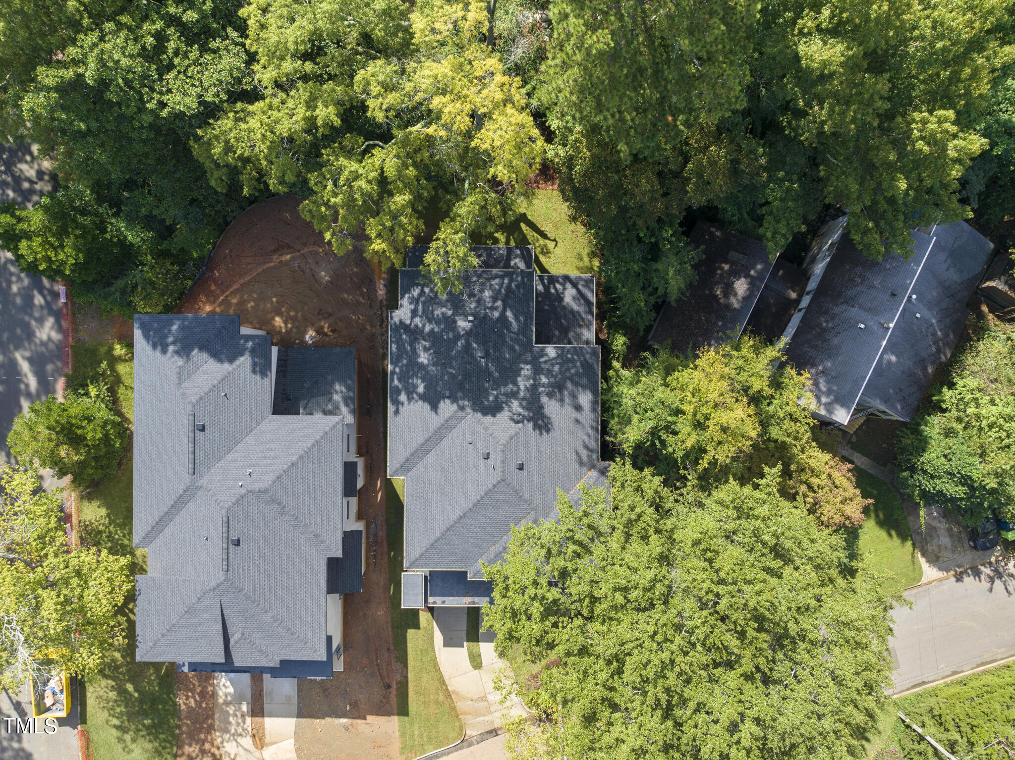 2603 Mayview Road Raleigh, NC 27607 - Photo 42 of 44 an aerial view of a house with garden space and a street view