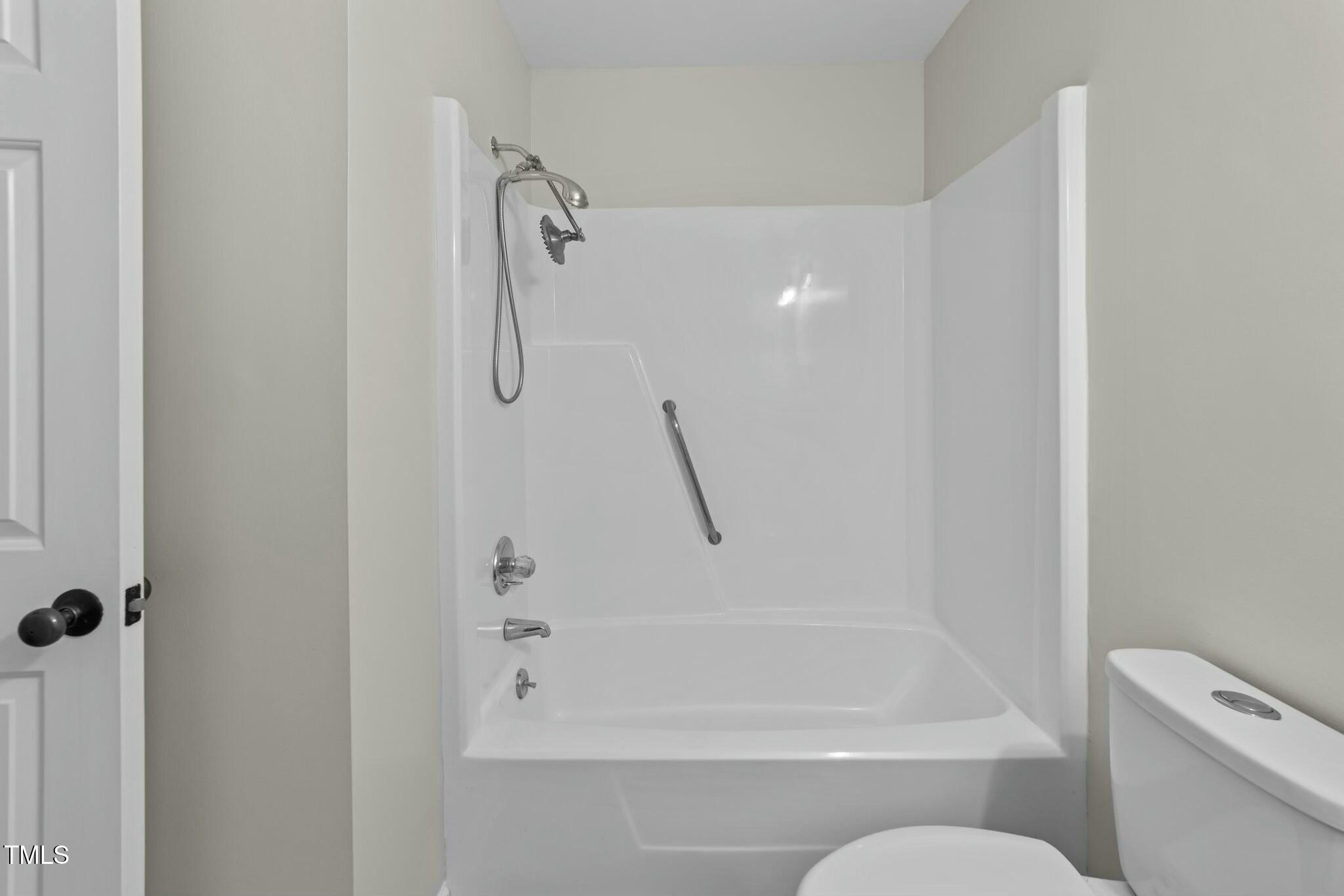 5809 Heatherbrook Circle Raleigh, NC 27612 - Photo 28 of 42 Shower/tub combo in hall bathroom.