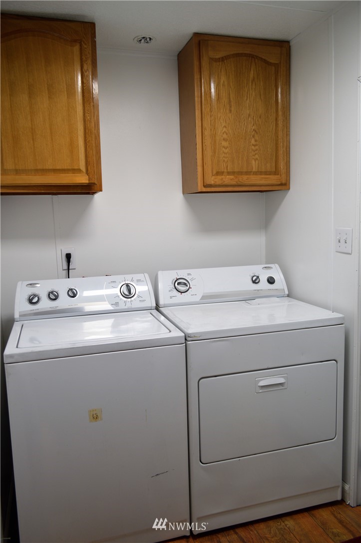 19129 Loganberry Street Southwest Rochester, WA 98579 - Photo 12 of 25 a utility room with dryer and washer