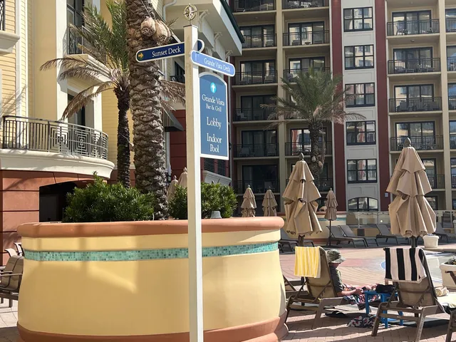 a view of swimming pool with outdoor seating