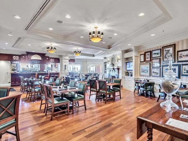 a view of a dining area with furniture window and wooden floor