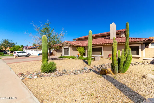 a front view of a building with garden