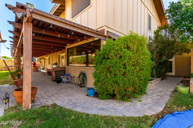 a view of a building with sitting area