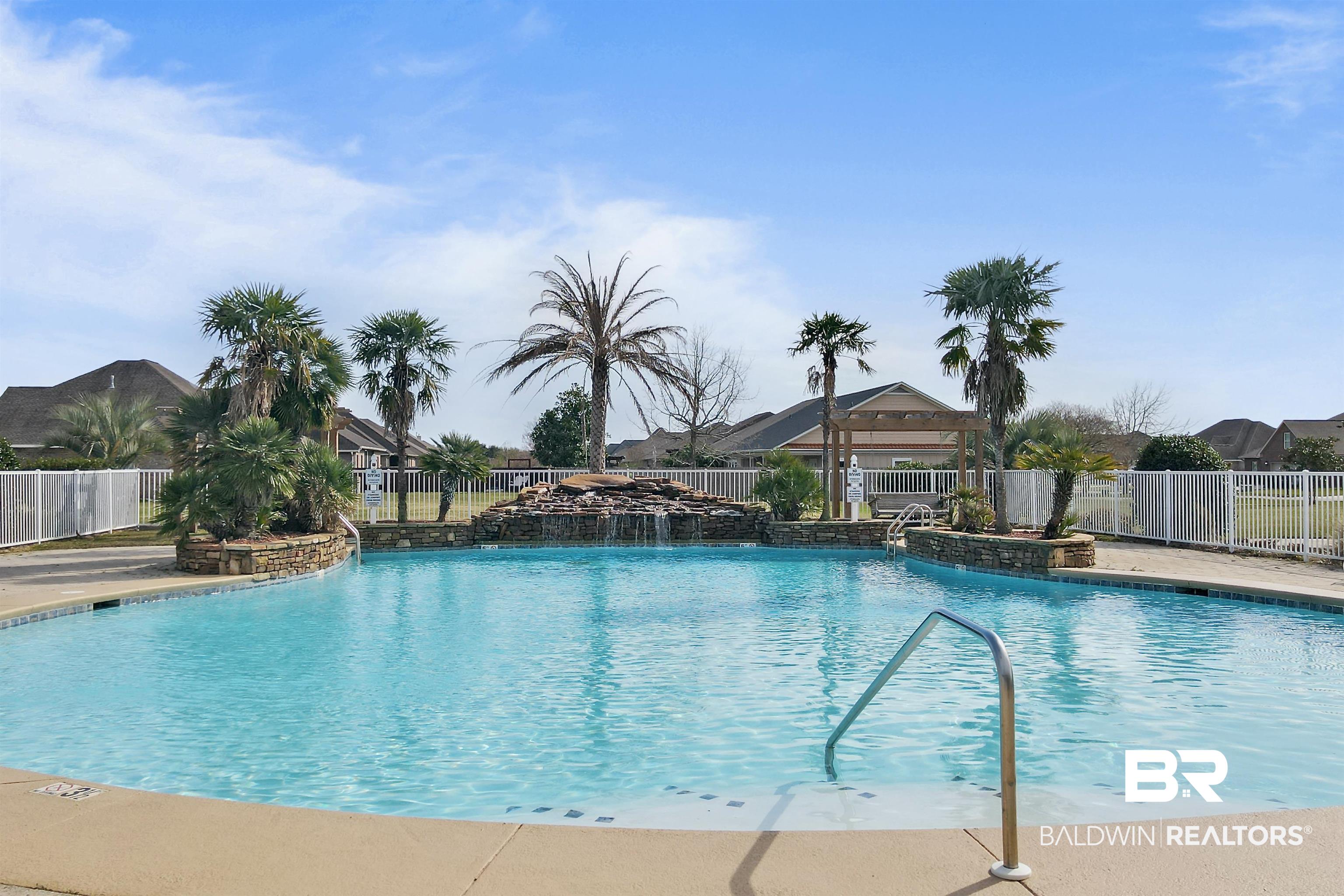 7090 Rocky Rd Loop Gulf Shores, AL 36542 - Photo 28 of 34 Pool featuring a gazebo and fence