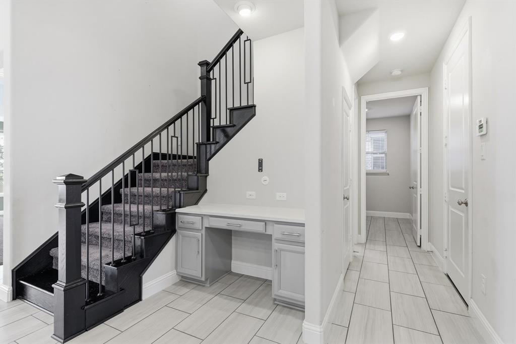 2114 Stanhill Drive Corinth, TX 76210 - Photo 13 of 40 a view of entryway and hall with a window
