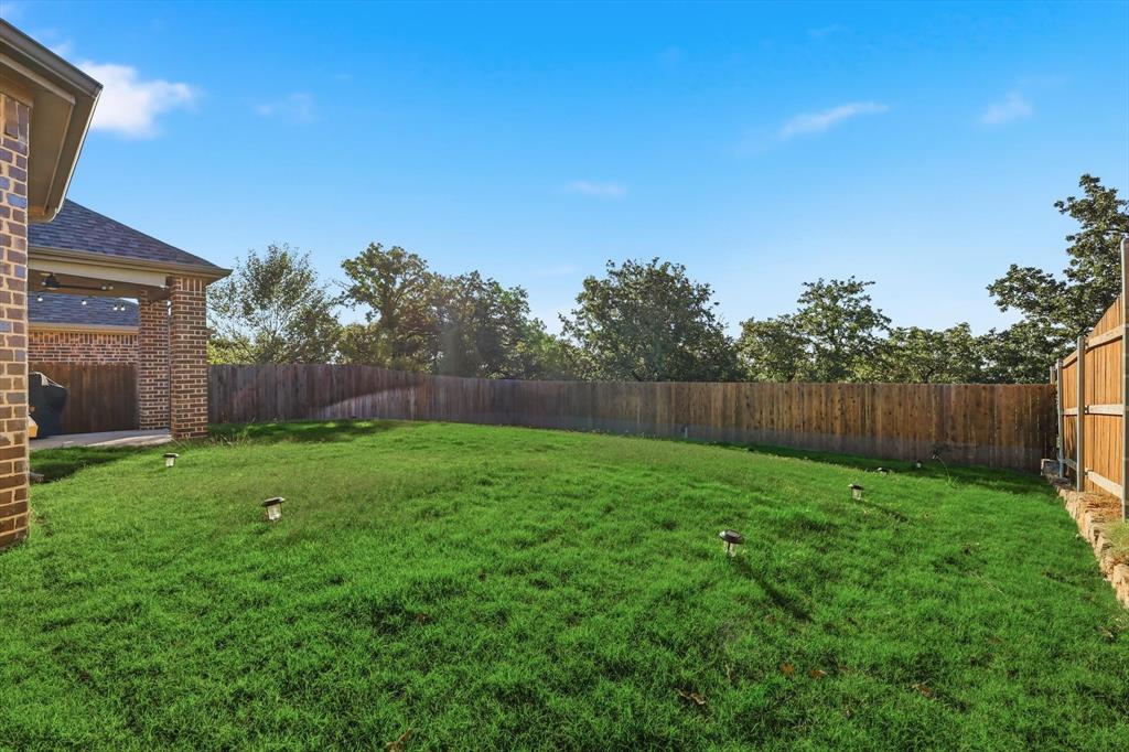 2114 Stanhill Drive Corinth, TX 76210 - Photo 39 of 40 a view of yard with green space