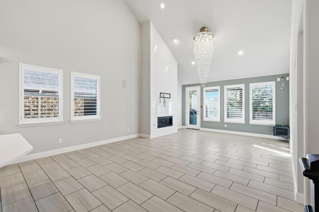 2114 Stanhill Drive Corinth, TX 76210 - Photo 10 of 40 a view of an empty room with a window