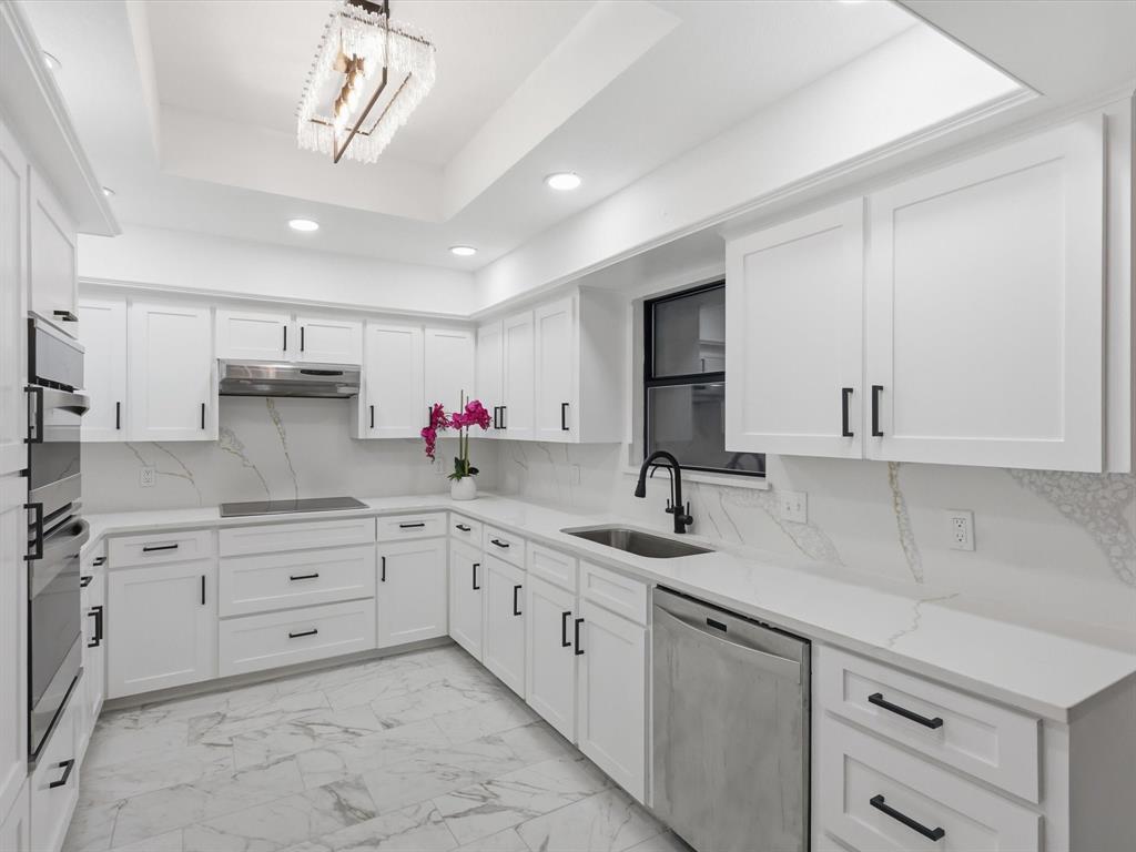 1202 High Ridge Drive Duncanville, TX 75137 - Photo 11 of 28 a kitchen with a sink cabinets and window