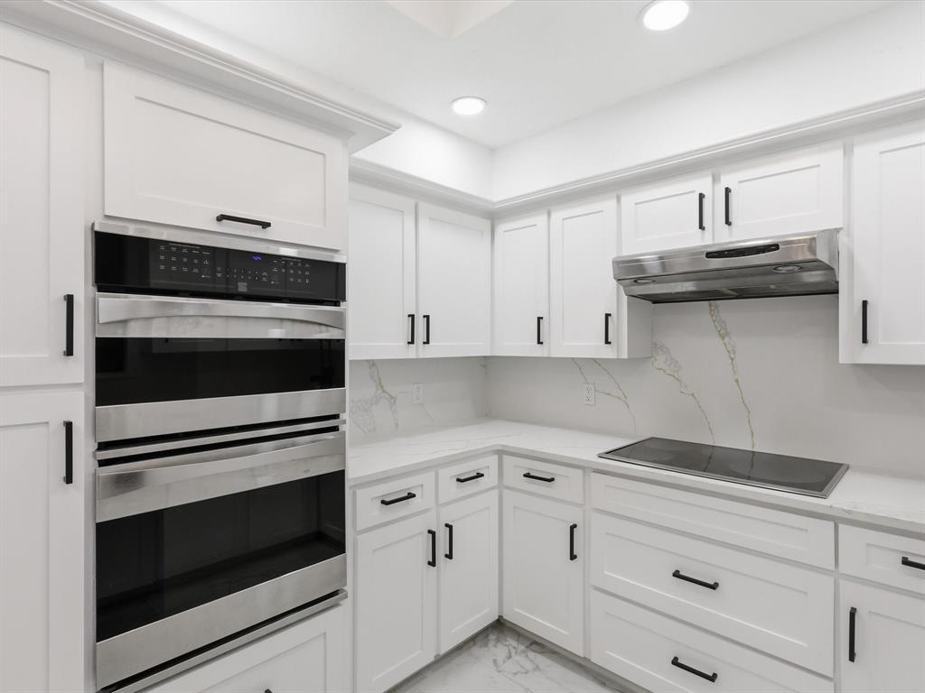 1202 High Ridge Drive Duncanville, TX 75137 - Photo 15 of 28 a kitchen with granite countertop cabinets and steel stainless steel appliances