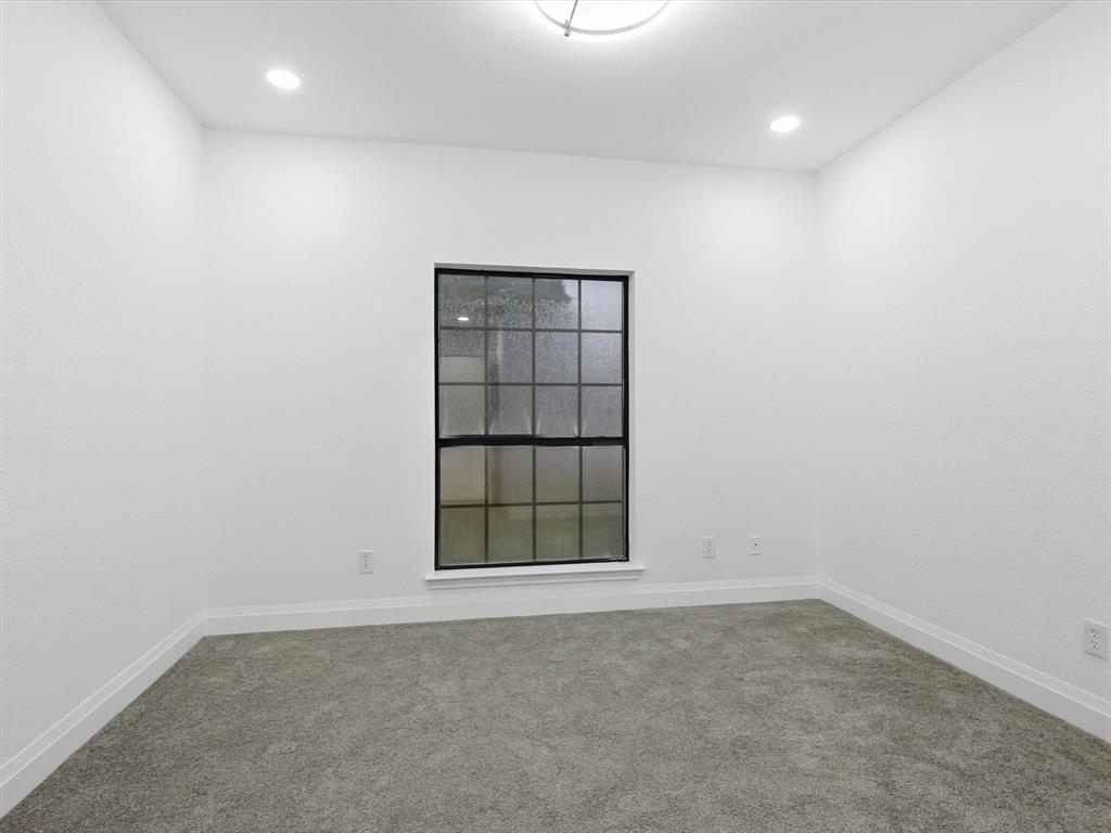 1202 High Ridge Drive Duncanville, TX 75137 - Photo 16 of 28 an empty room with a empty space and window