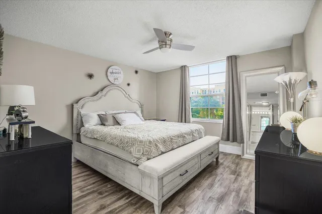 a view of swimming pool with chairs