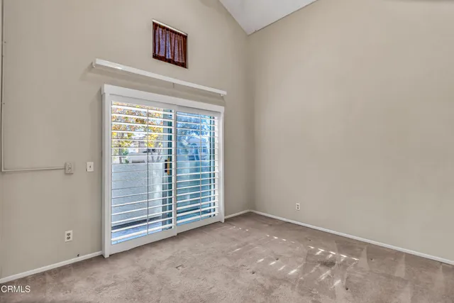 an empty room with a hallway