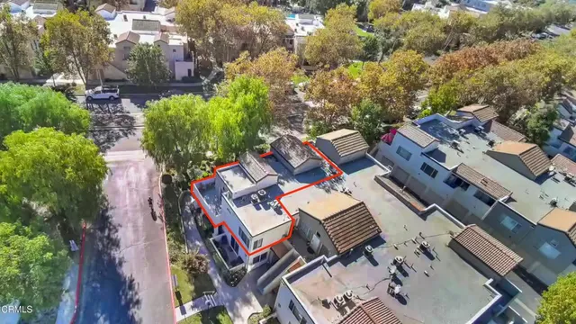 an aerial view of residential house with outdoor space