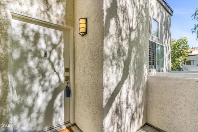 a view of balcony with wooden floor