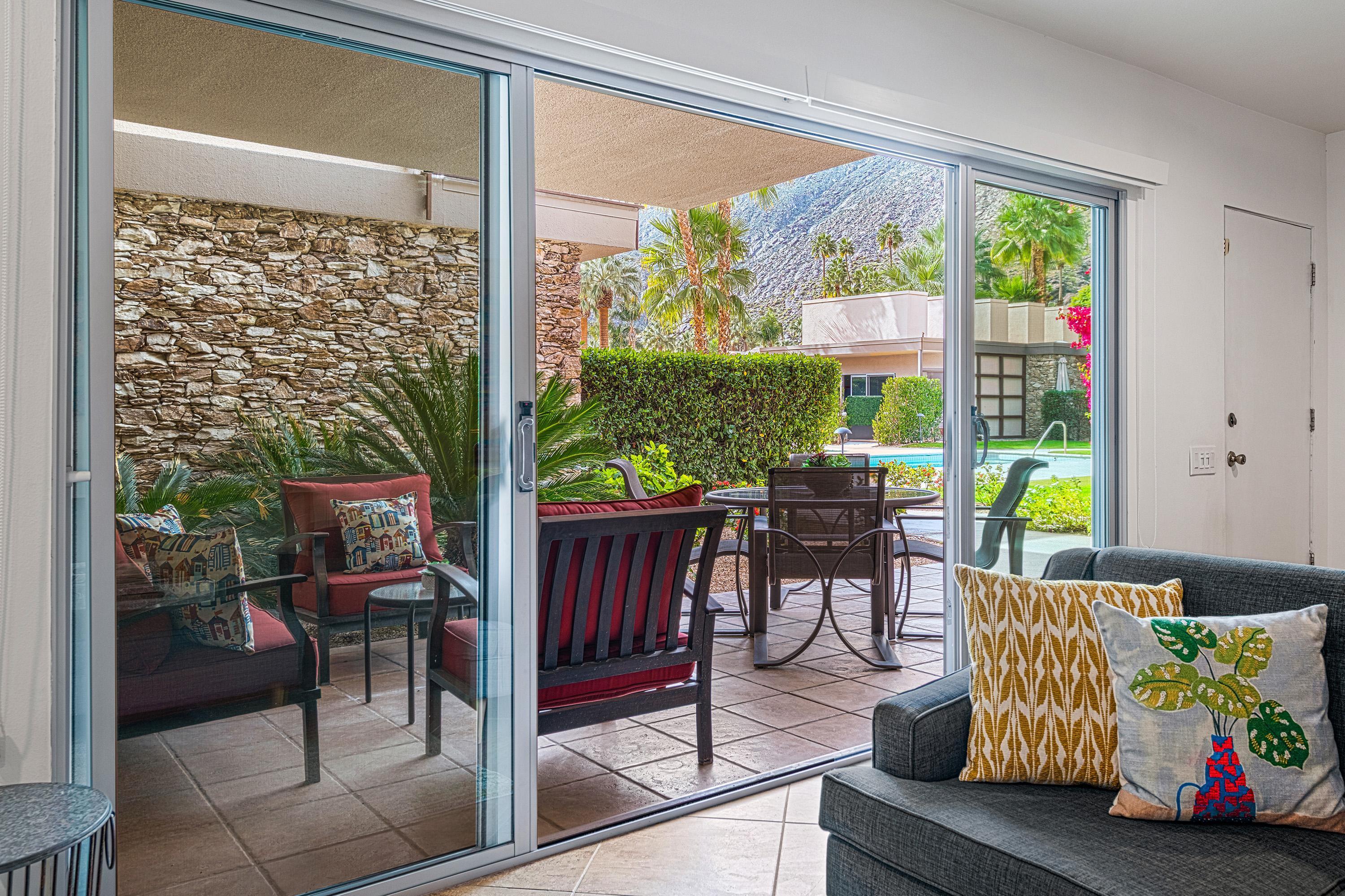 500 West Arenas Road, Unit 4 Palm Springs, CA 92262 - Photo 3 of 40 a outdoor living space with furniture