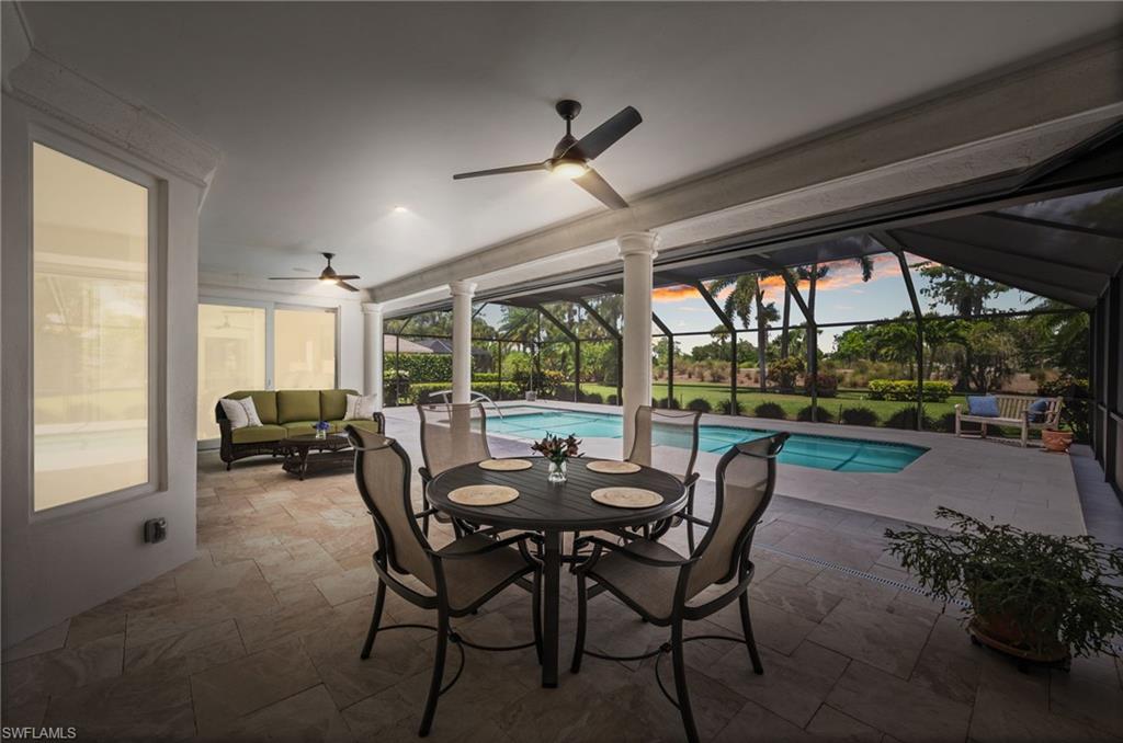 2003 Duke Drive Naples, FL 34110 - Photo 44 of 45 a view of a dining room with furniture window and outside view