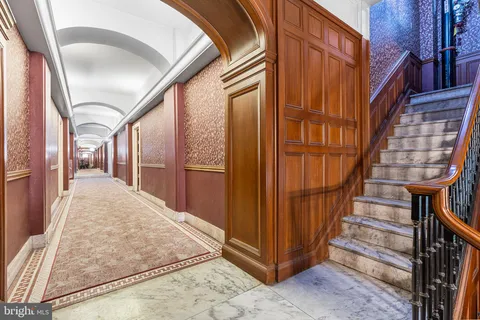 a view of parking garage with cars