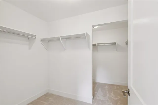 a view of an empty walk in closet