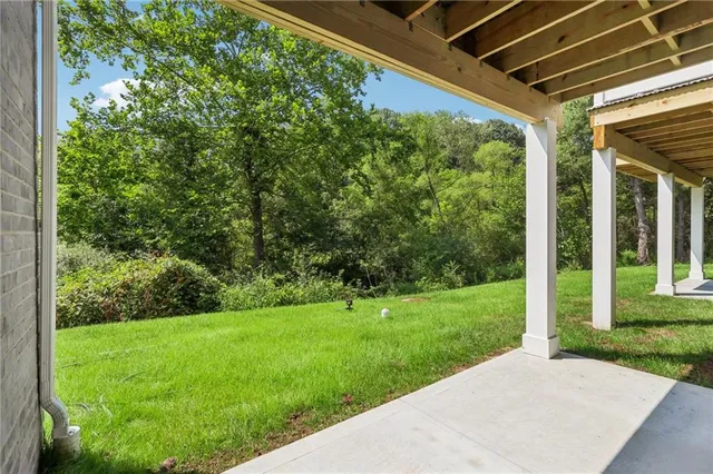 a view of a backyard with garden