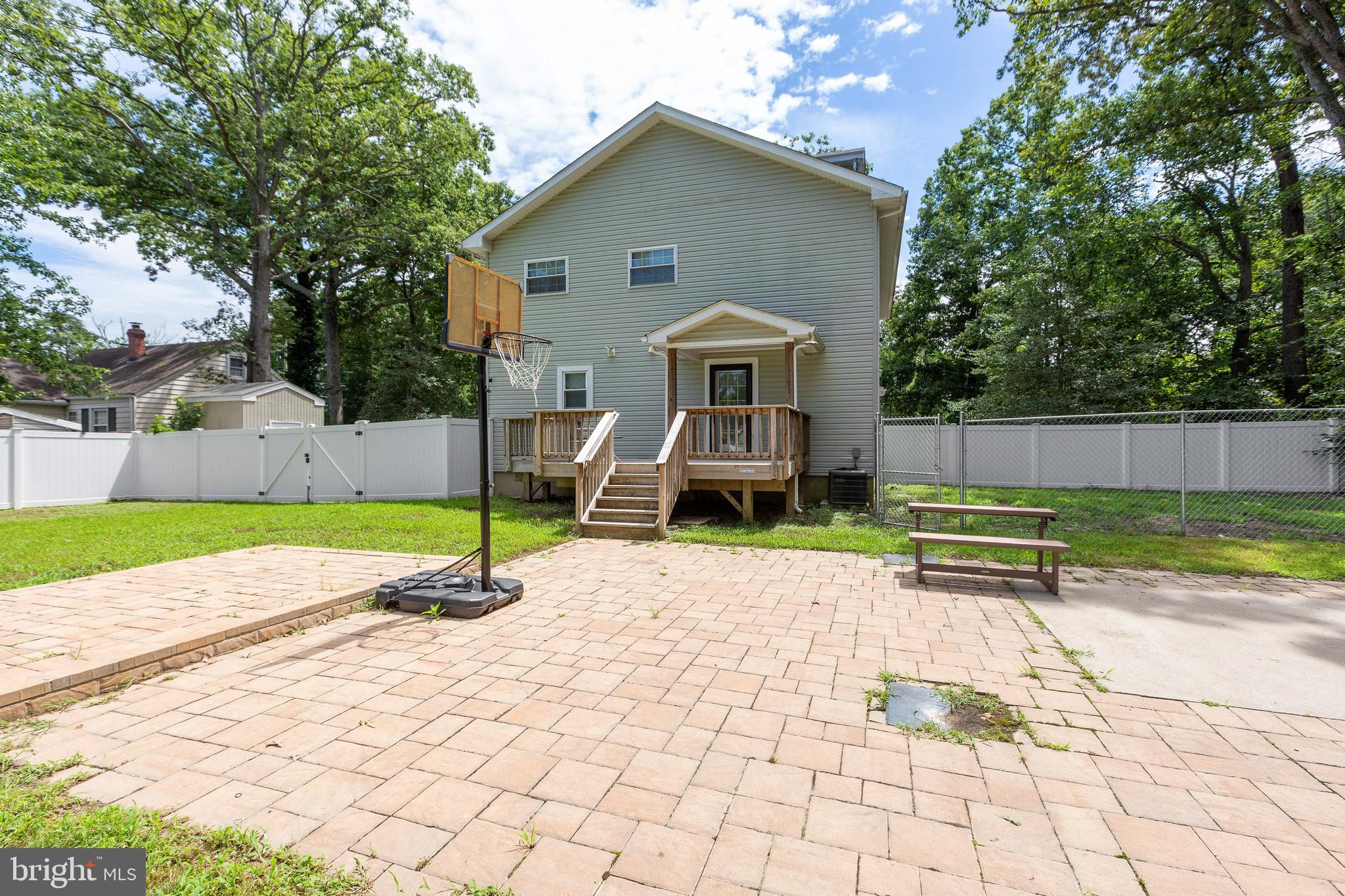 8105 Woodyard Road Clinton, MD 20735 - Photo 37 of 41 Backyard with Large Stone Patio