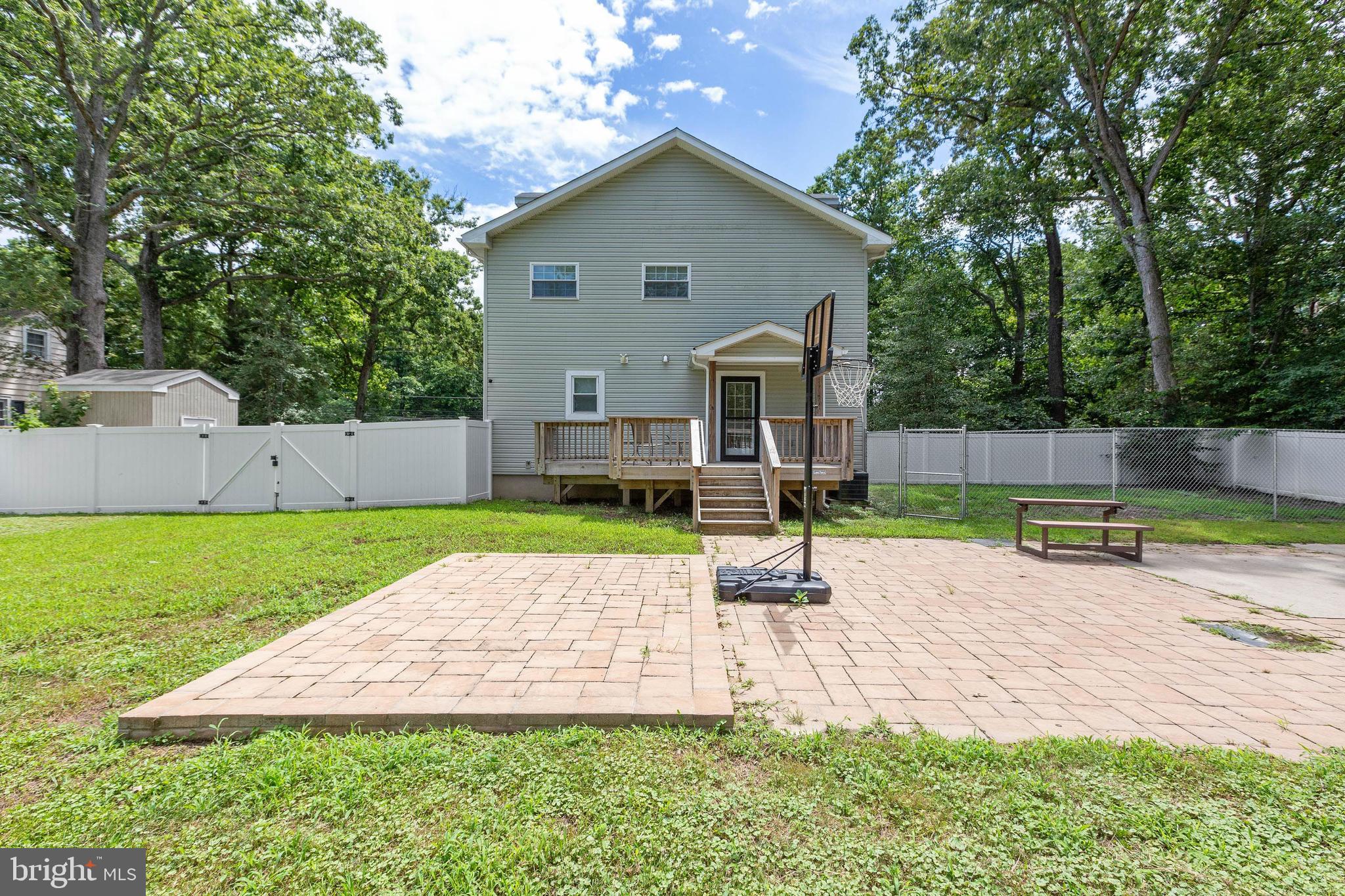 8105 Woodyard Road Clinton, MD 20735 - Photo 38 of 41 Backyard with Large Deck