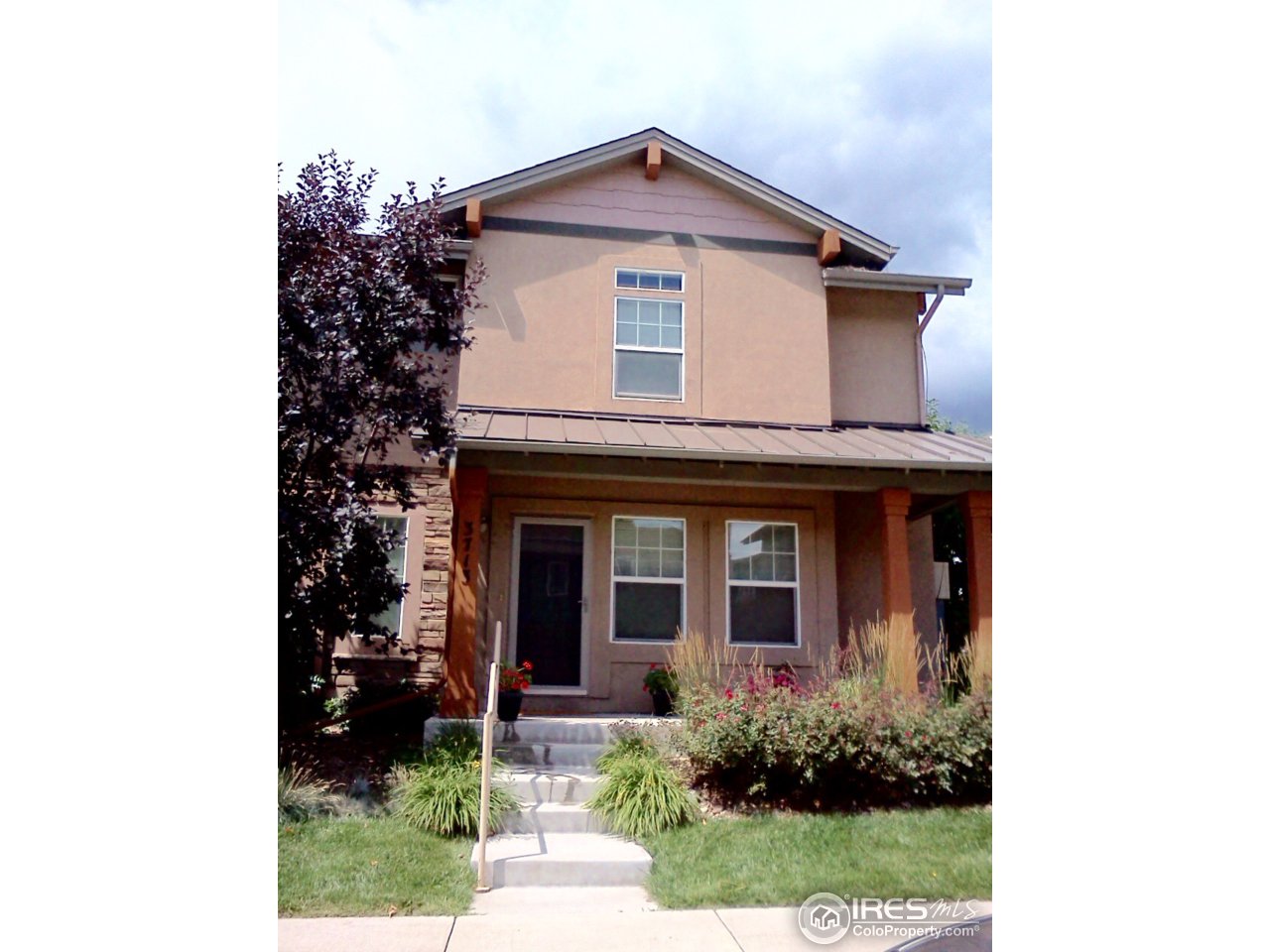 3713 Ridgeway Street Boulder, CO 80301 - Photo 1 of 13 Front in spring