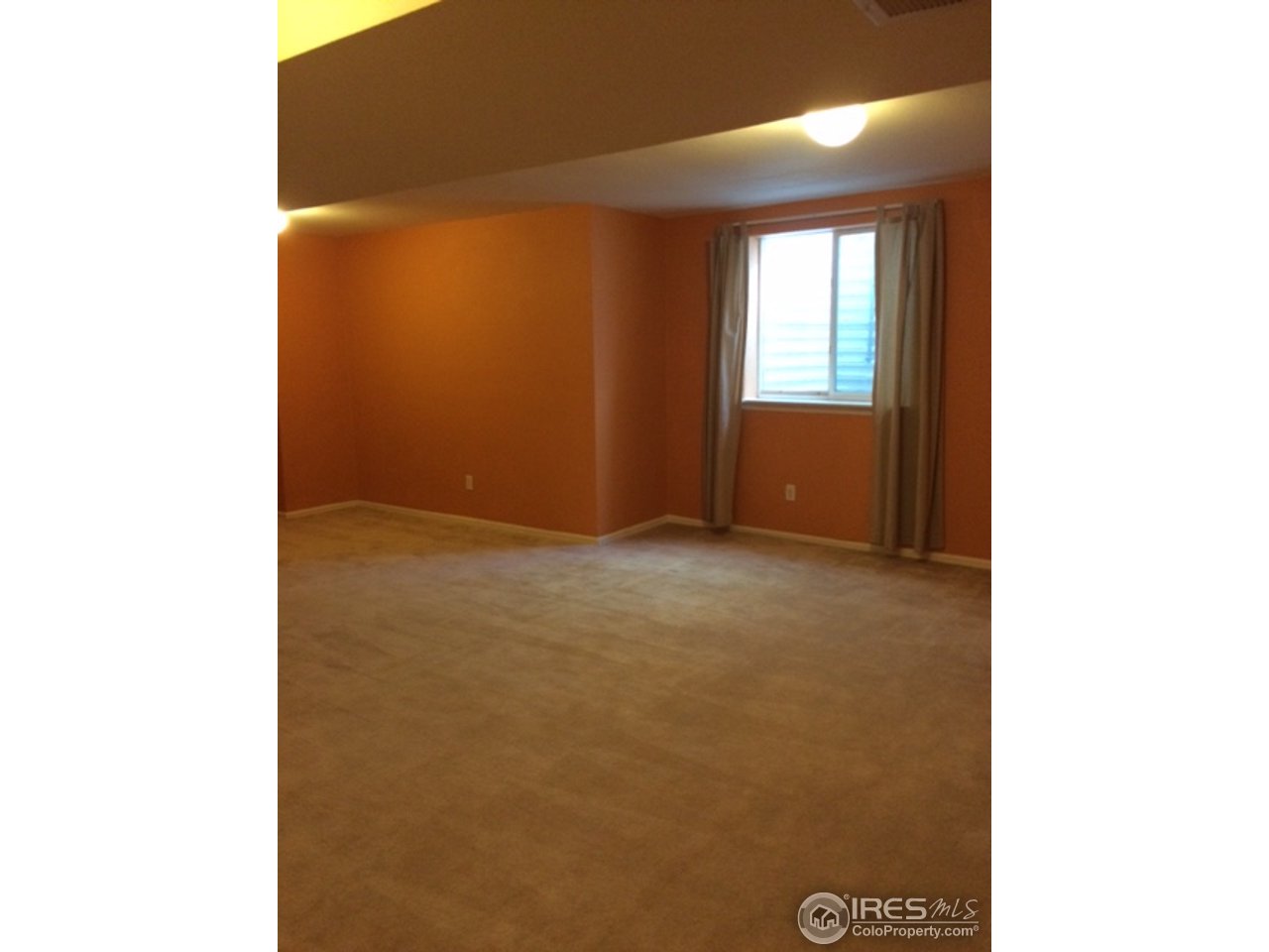 3713 Ridgeway Street Boulder, CO 80301 - Photo 11 of 13 High Ceiling Basement w. egress Window