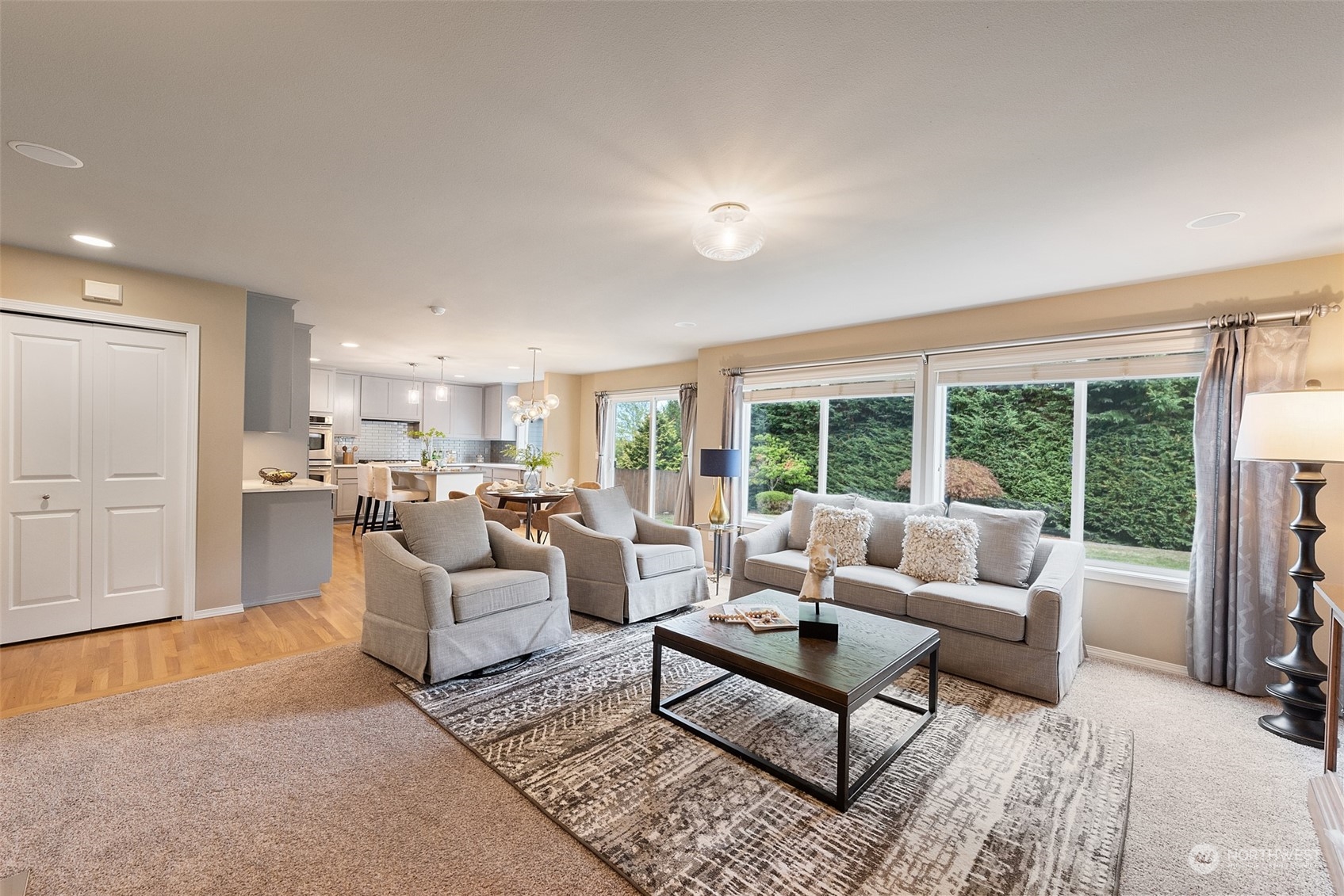 4411 240 Place Southeast Bothell, WA 98021 - Photo 12 of 36 a living room with furniture and a large window