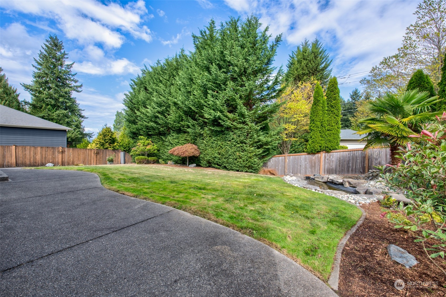 4411 240 Place Southeast Bothell, WA 98021 - Photo 33 of 36 a view of a house with a yard and a street