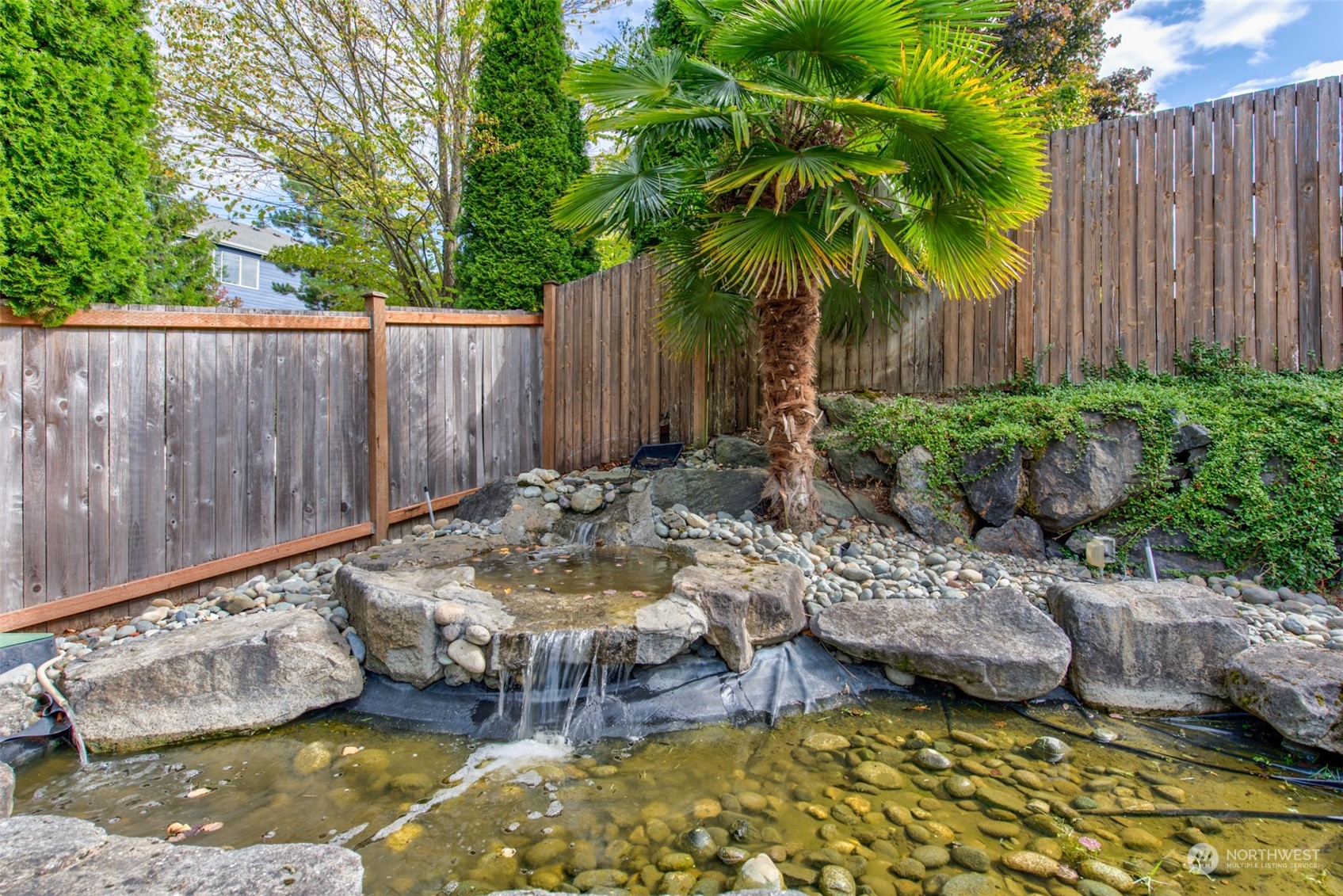 4411 240 Place Southeast Bothell, WA 98021 - Photo 35 of 36 a view of swimming pool with a patio