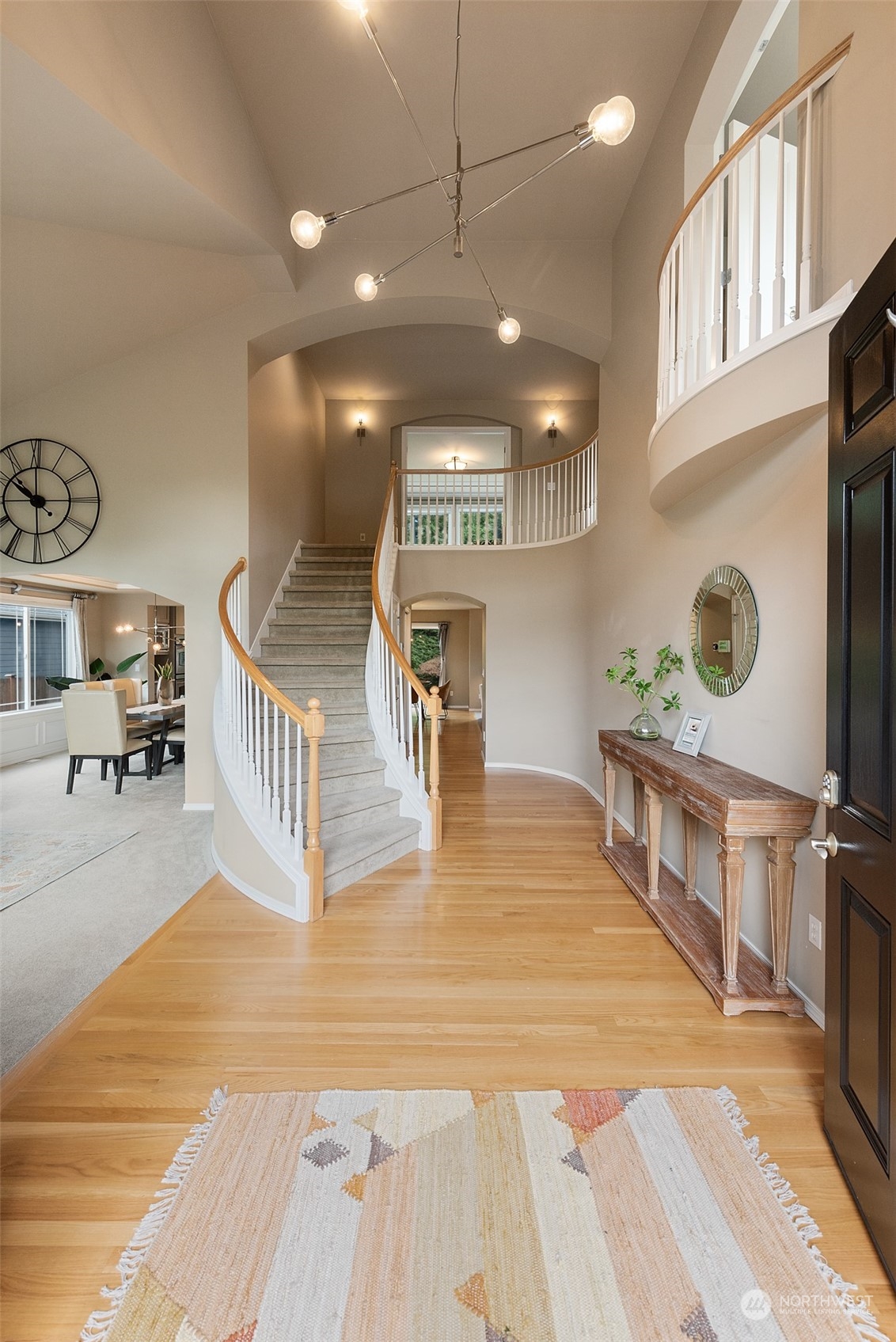 4411 240 Place Southeast Bothell, WA 98021 - Photo 4 of 36 a view of a living room and kitchen