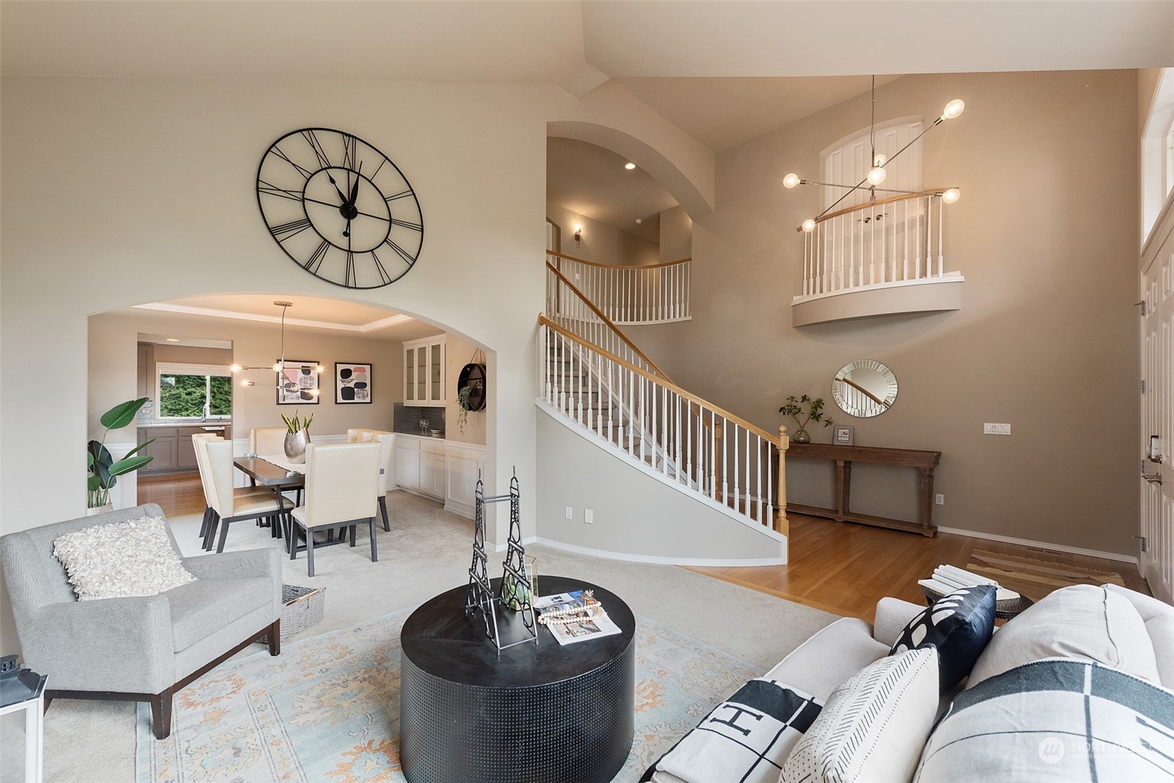 4411 240 Place Southeast Bothell, WA 98021 - Photo 7 of 36 a living room with furniture a chandelier and wooden floor