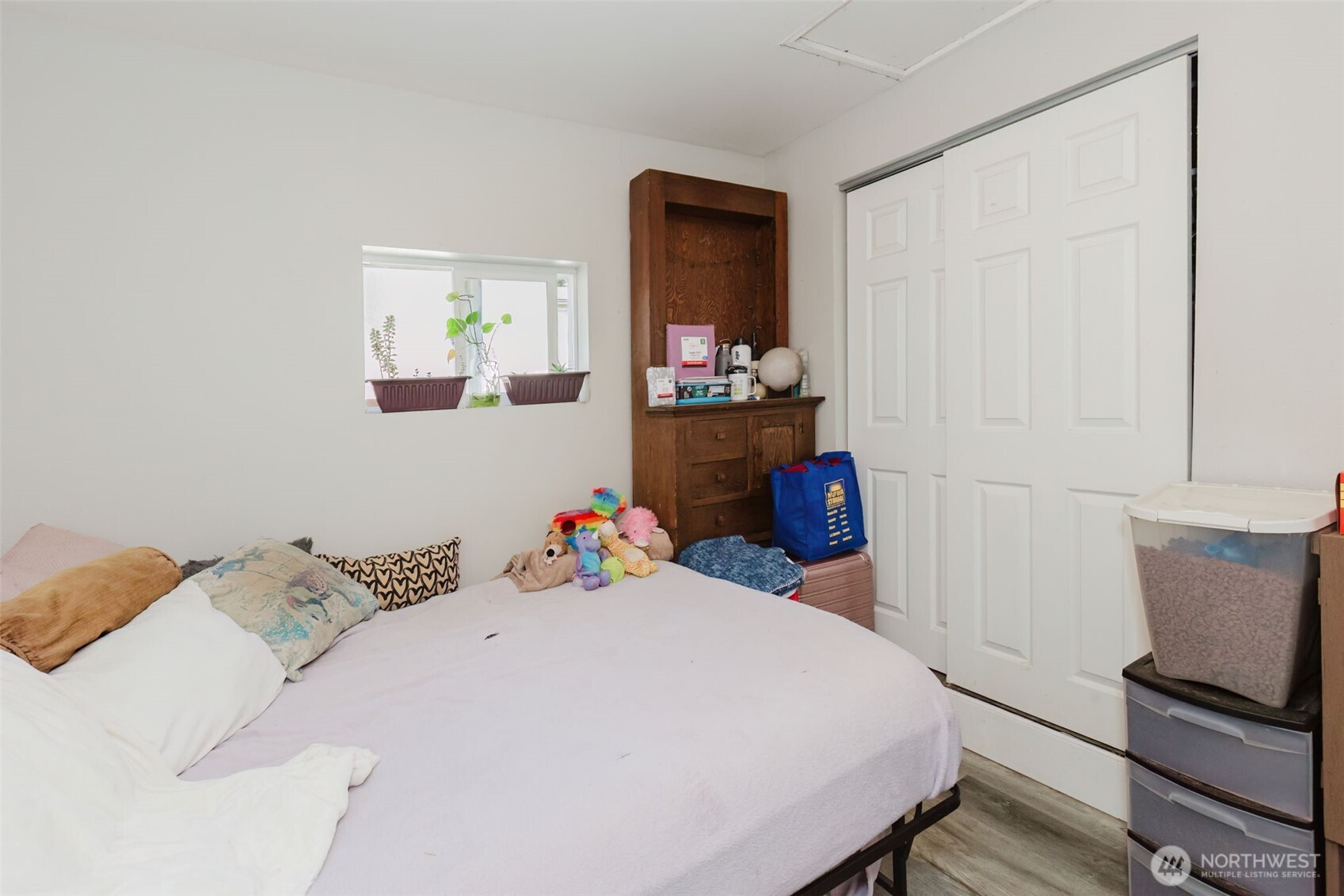 2824 Robin Avenue Bremerton, WA 98310 - Photo 11 of 31 a bedroom with a bed and a dresser in it