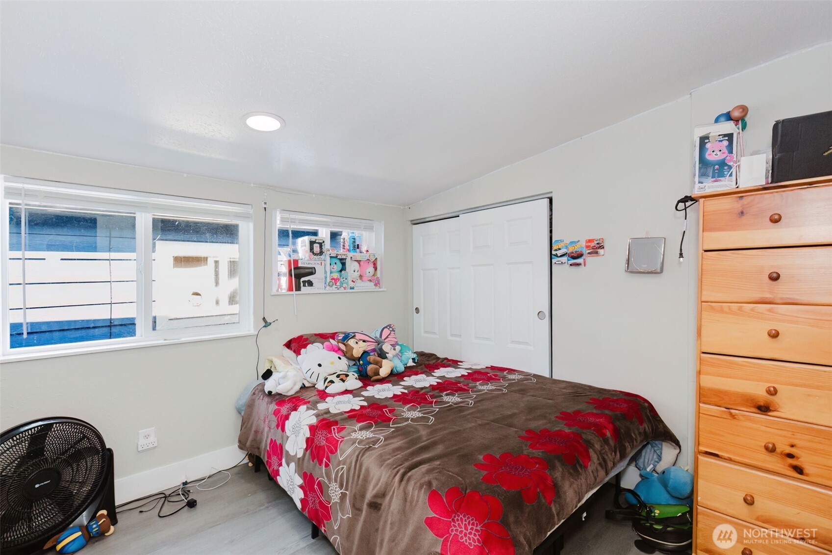 2824 Robin Avenue Bremerton, WA 98310 - Photo 12 of 31 a bedroom with a bed and cabinets