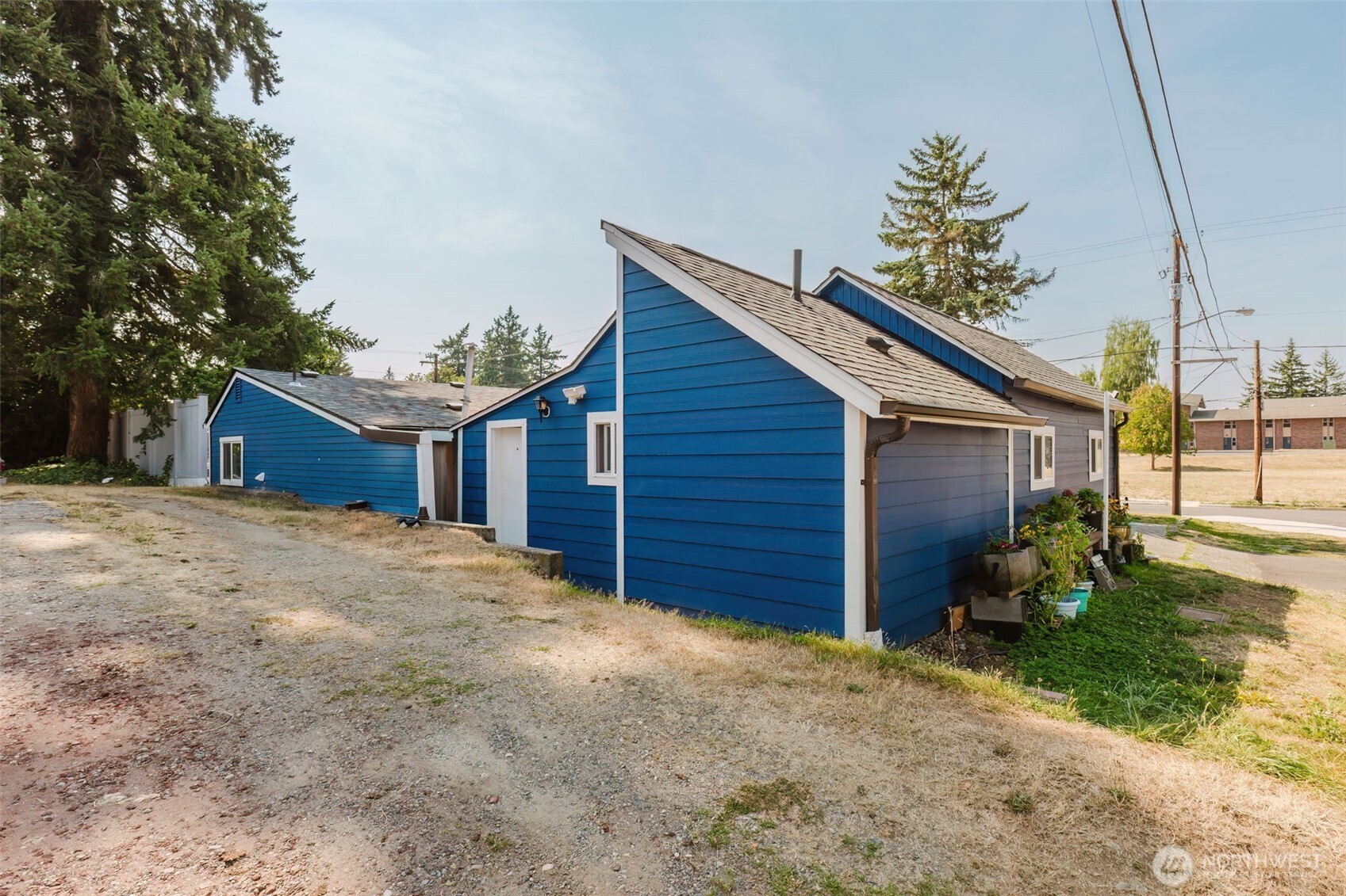 2824 Robin Avenue Bremerton, WA 98310 - Photo 17 of 31 a view of a house with a backyard