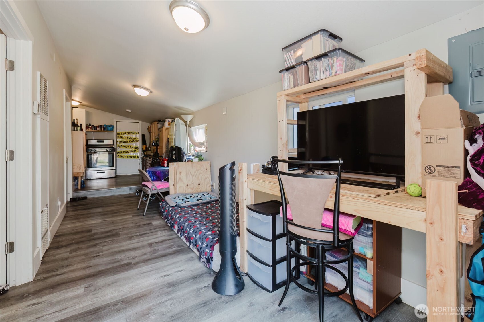 2824 Robin Avenue Bremerton, WA 98310 - Photo 18 of 31 a living room with furniture and a flat screen tv