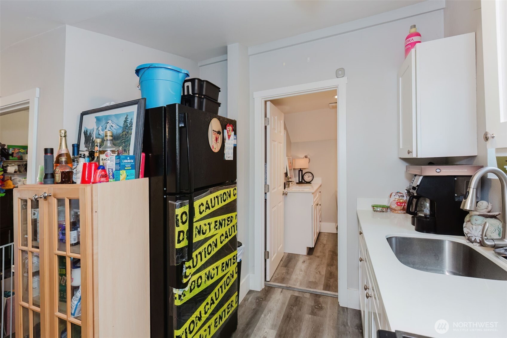 2824 Robin Avenue Bremerton, WA 98310 - Photo 22 of 31 a kitchen with a refrigerator and a sink
